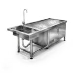 Paslanmaz çelik evyeli otopsi/diseksiyon masası. Delikli drenaj tabla, sıvı tahliye sistemi ve alt dolap. Kurulum, garanti, profesyonel teslimat.